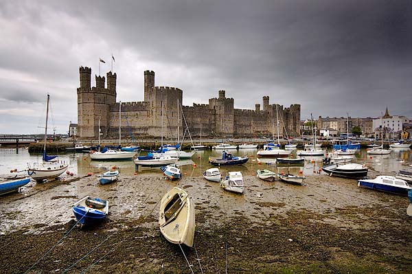 Caernarfon Castle on a cloudy day.